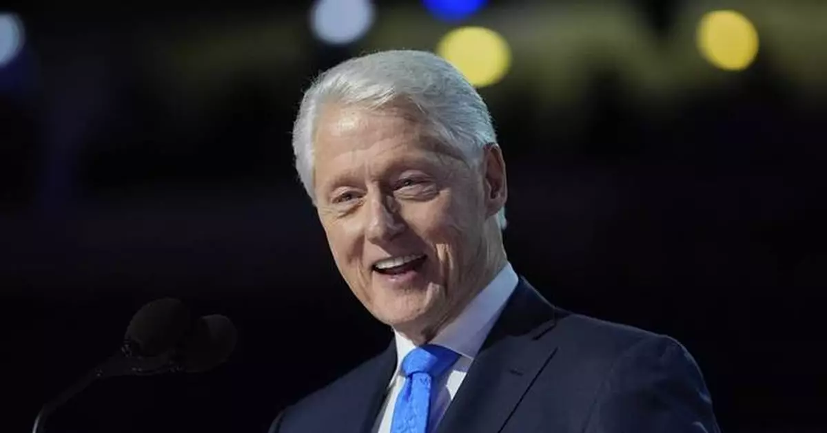 Bill Clinton is hospitalized with a fever but in good spirits, spokesperson says