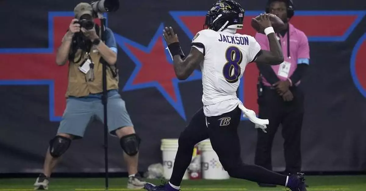 Lamar Jackson breaks NFL QB rushing record, accounts for 3 TDs in Ravens' 31-2 romp over Texans