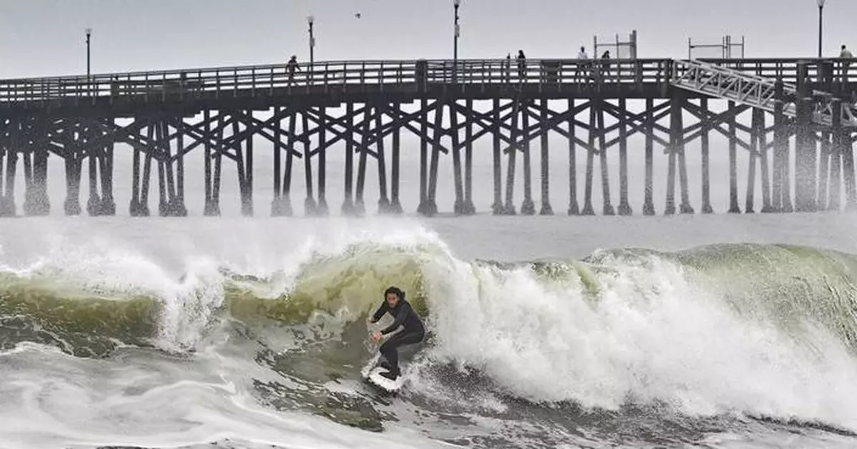 Major storm pounds California's central coast, blamed for man's death and partially collapsing pier