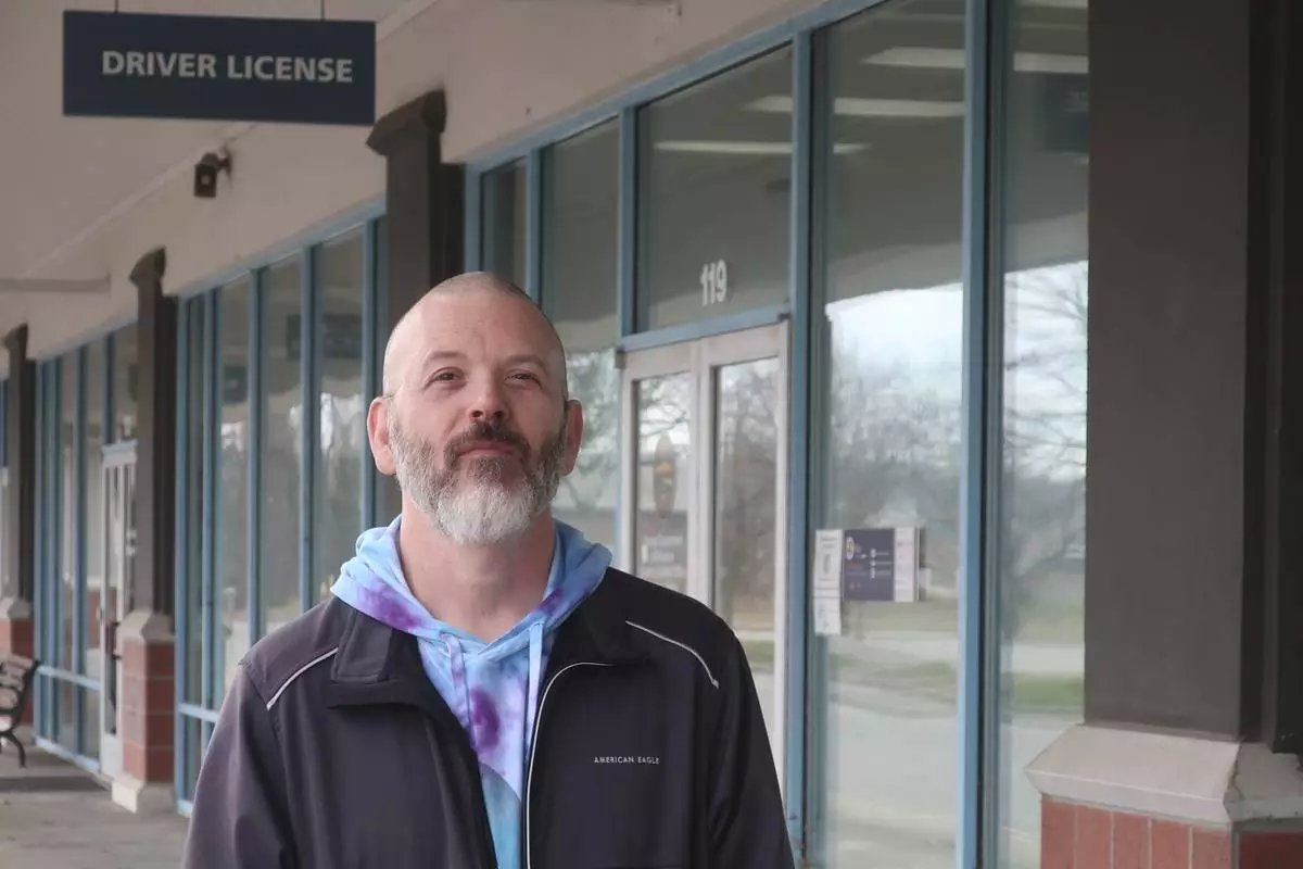 Steven Fish, of Garnett, Kan., returns to the strip mall where he tried to register to vote in 2014 but couldn’t because of a proof-of-citizenship requirement later struck down by the federal courts, Monday, Dec. 9, 2024, in Lawrence, Kan. (AP Photo/John Hanna)