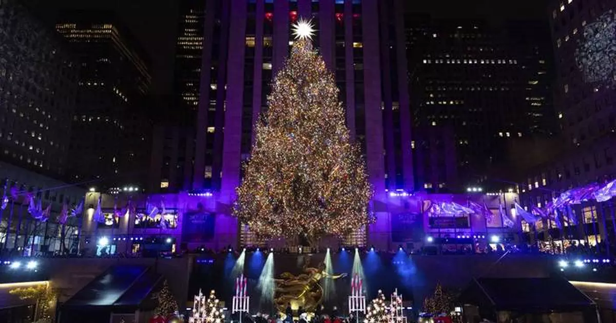 The Rockefeller Center Christmas tree lights up in New York City