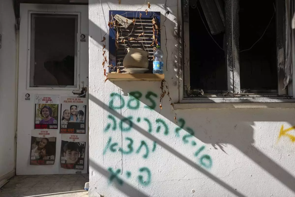 The home of Ofer Kalderon, hostage who were pulled into Gaza by Hamas militants in their Oct. 7, 2023 attack, stands empty after nearly 15 months of war in kibbutz Nir Oz, southern Israel, Thursday Dec. 5, 2024 (AP Photo/Ohad Zwigenberg)