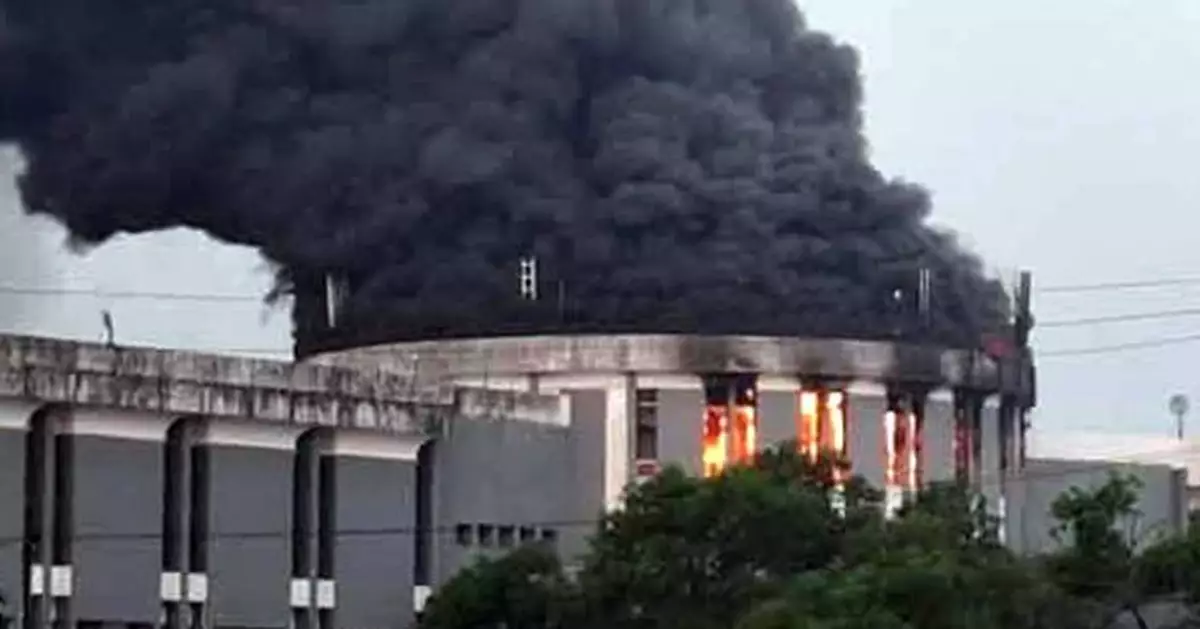 Liberia's parliament building catches fire as anti-government protests enter a second day