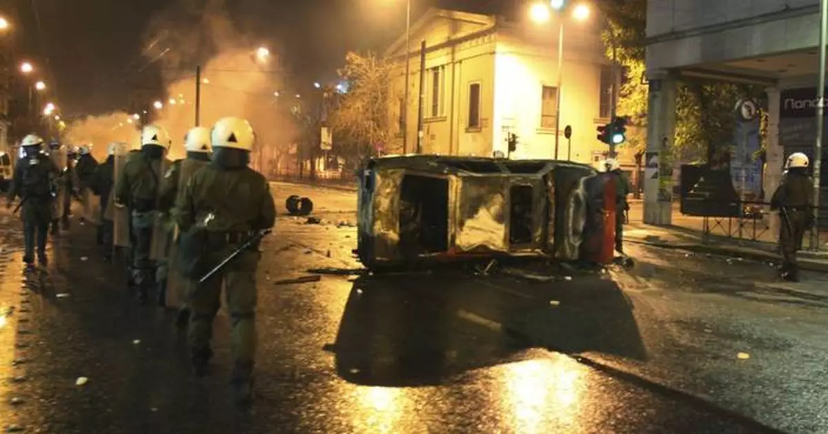 Thousands march through Greek capital on anniversary of fatal police shooting