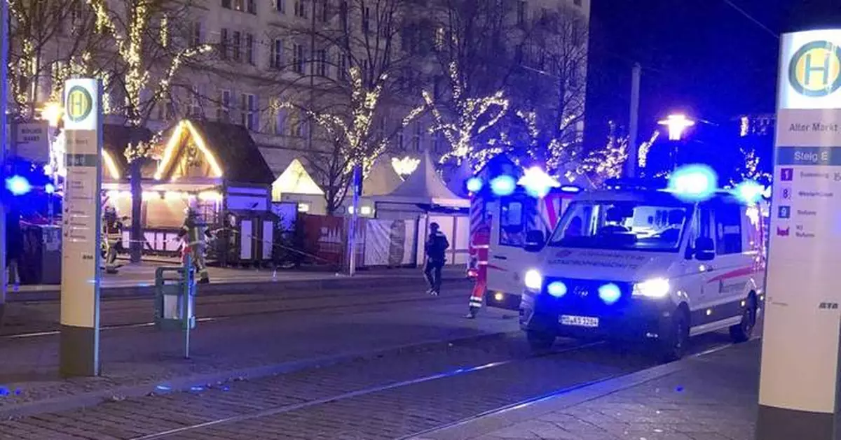 At least 2 dead and 60 hurt after a car drives into a German Christmas market in a suspected attack