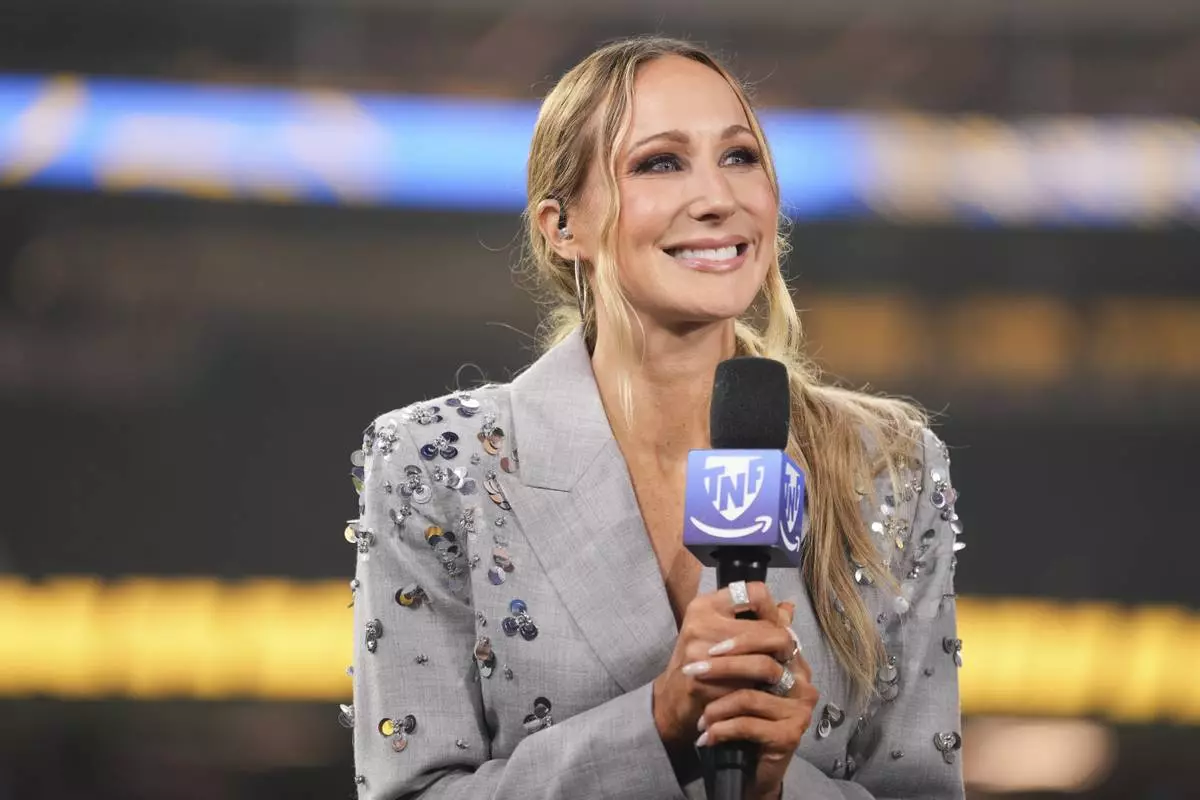 Nikki Glaser participates in a segment after an NFL football game between the Los Angeles Chargers and the Denver Broncos, Thursday, Dec. 19, 2024, in Inglewood, Calif. (AP Photo/Eric Thayer)