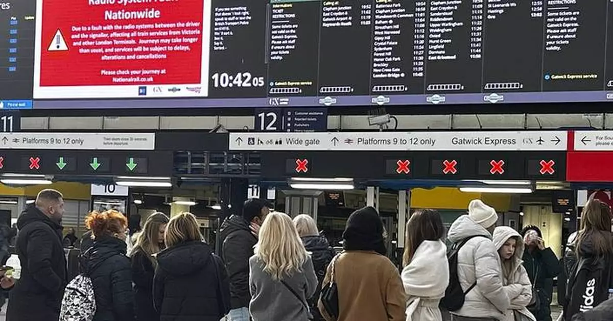 UK rail travel returns to normal after problems with a radio system disrupted the morning commute