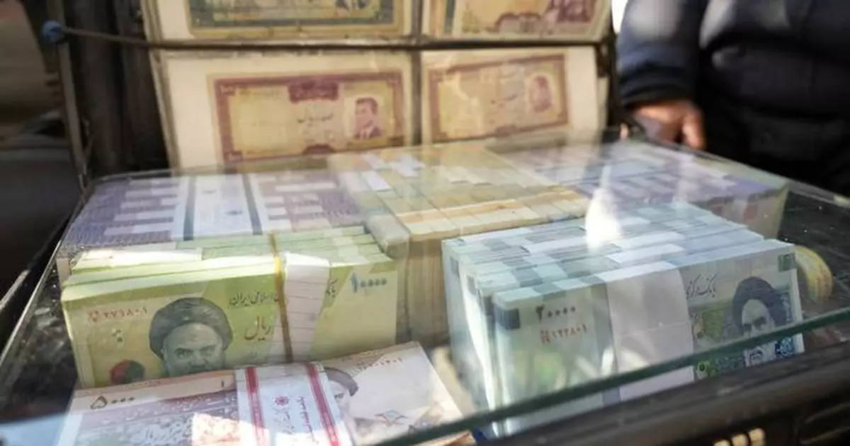 Iran's rial hits a record low, battered by regional tensions and an energy crisis