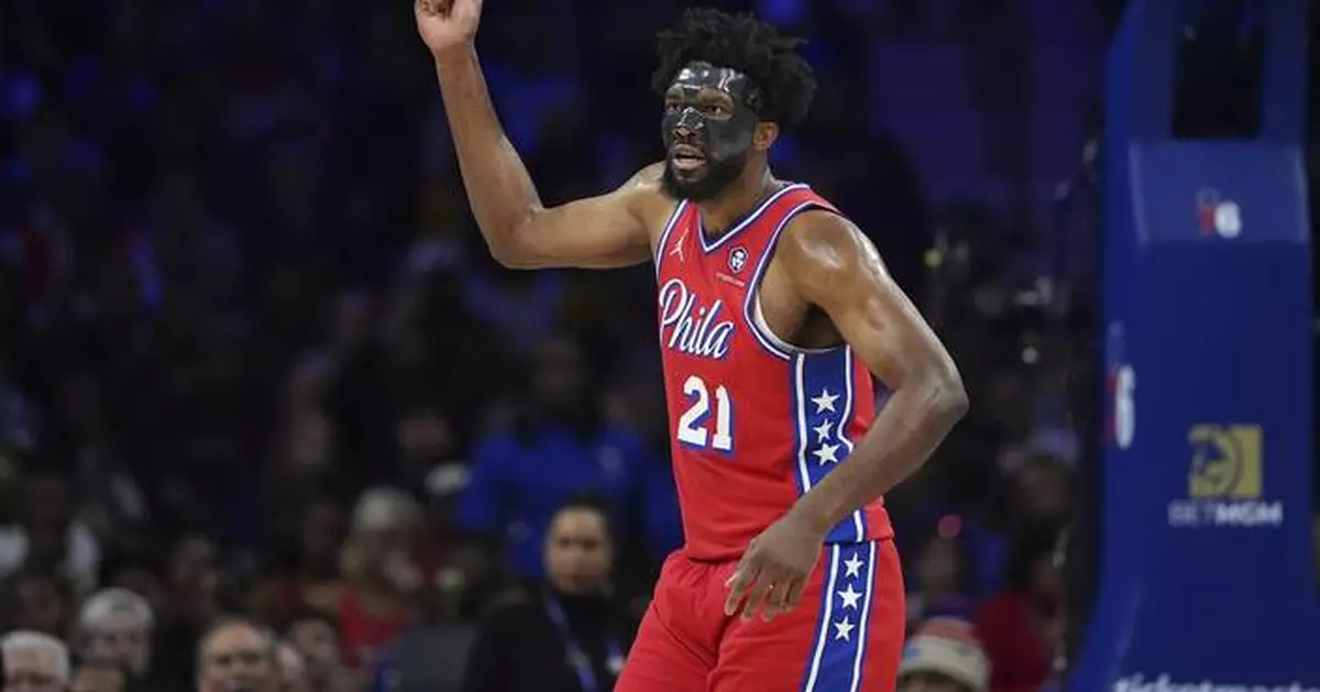 Embiid scores 34 points in return, helping the 76ers beat the Hornets 108-98