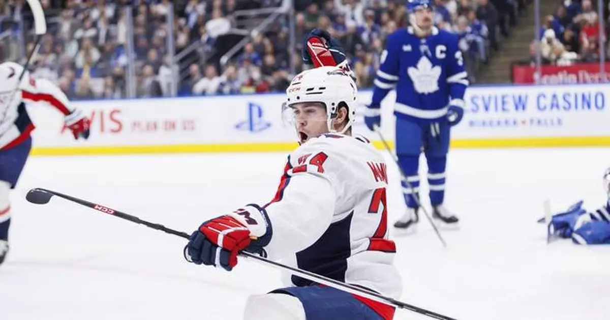 McMichael helps the Capitals beat the Maple Leafs 3-1 for franchise-record 8th straight road win