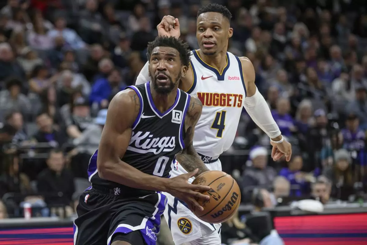 Jokic has another triple-double as Nuggets rally past Kings 130-129