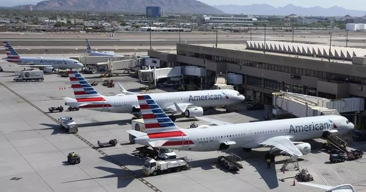 Heavy travel day starts with brief grounding of all American Airlines flights