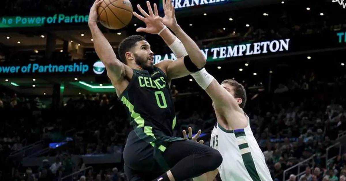 Jayson Tatum scores 34, Celtics beat Bucks 111-105 to spoil Khris Middleton's season debut