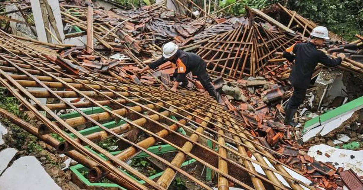 Landslides and flash floods hit Indonesia’s Java island, leaving 10 dead and 2 missing
