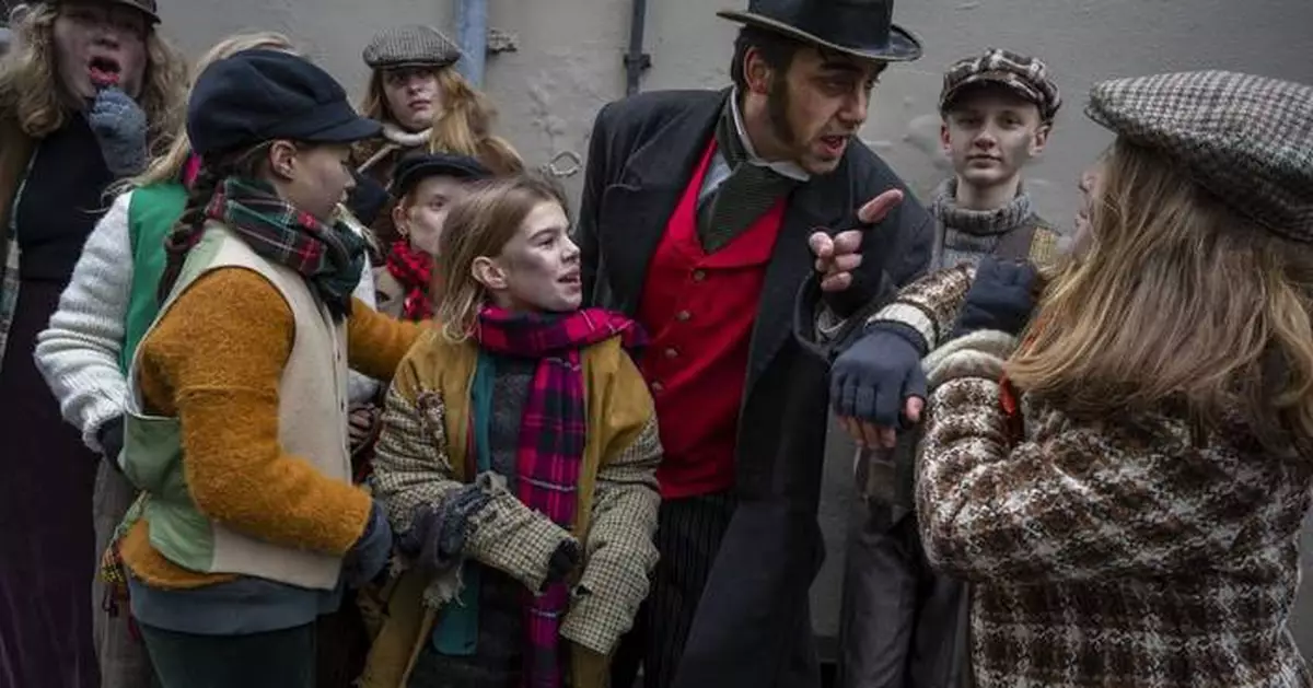 Charles Dickens' characters come alive in a Dutch town enamored with the English author