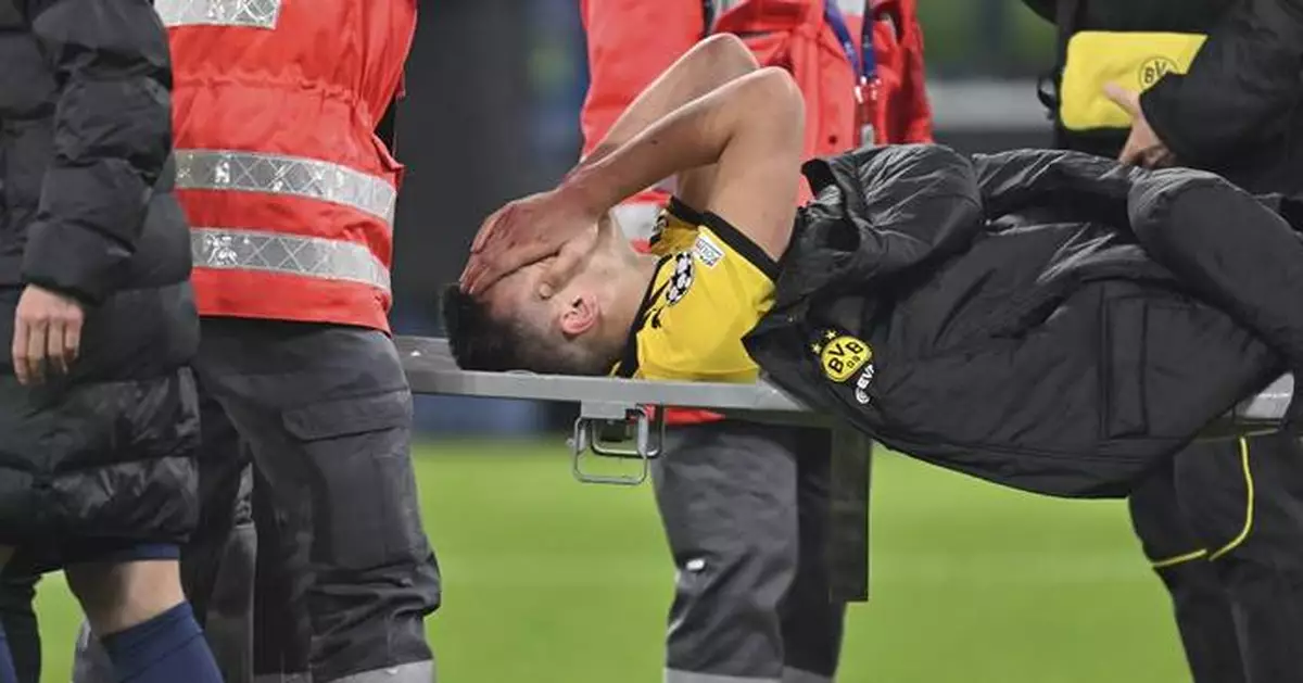 Dortmund's Nico Schlotterbeck taken off on stretcher with ankle injury in loss to Barcelona