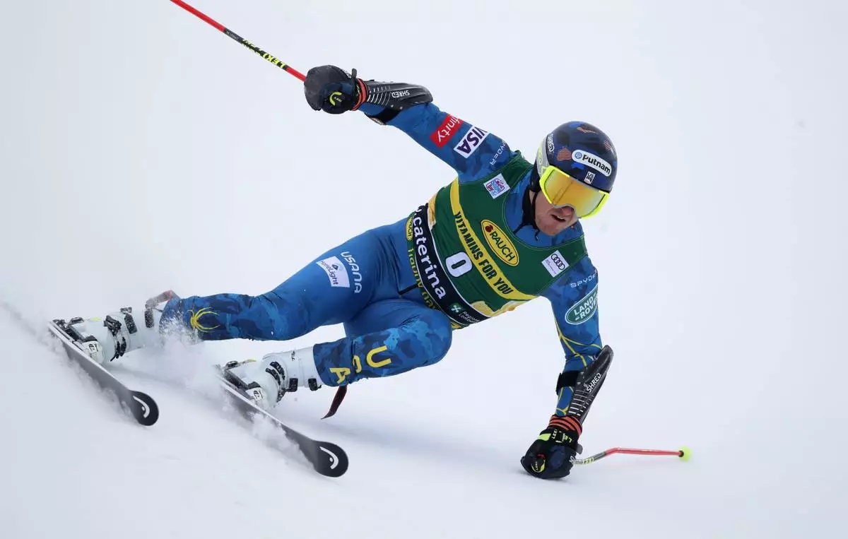 FILE - United States' Ted Ligety competes during the first run of an alpine ski, World Cup men's giant slalom in Santa Caterina Valfurva, Italy, Monday, Dec. 7, 2020. (AP Photo/Gabriele Facciotti, File)