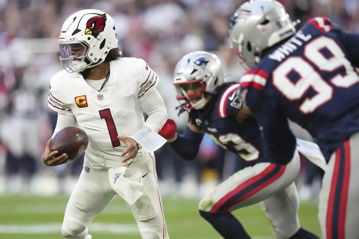 Arizona Cardinals quarterback Kyler Murray (1) scrambles against the New England Patriots during the second half of an NFL football game, Sunday, Dec. 15, 2024, in Glendale, Ariz. (AP Photo/Ross D. Franklin)