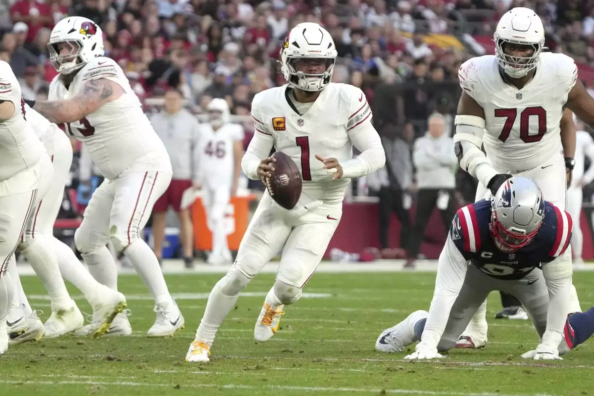 Arizona Cardinals quarterback Kyler Murray (1) scrambles against the New England Patriots during the second half of an NFL football game, Sunday, Dec. 15, 2024, in Glendale, Ariz. (AP Photo/Rick Scuteri)