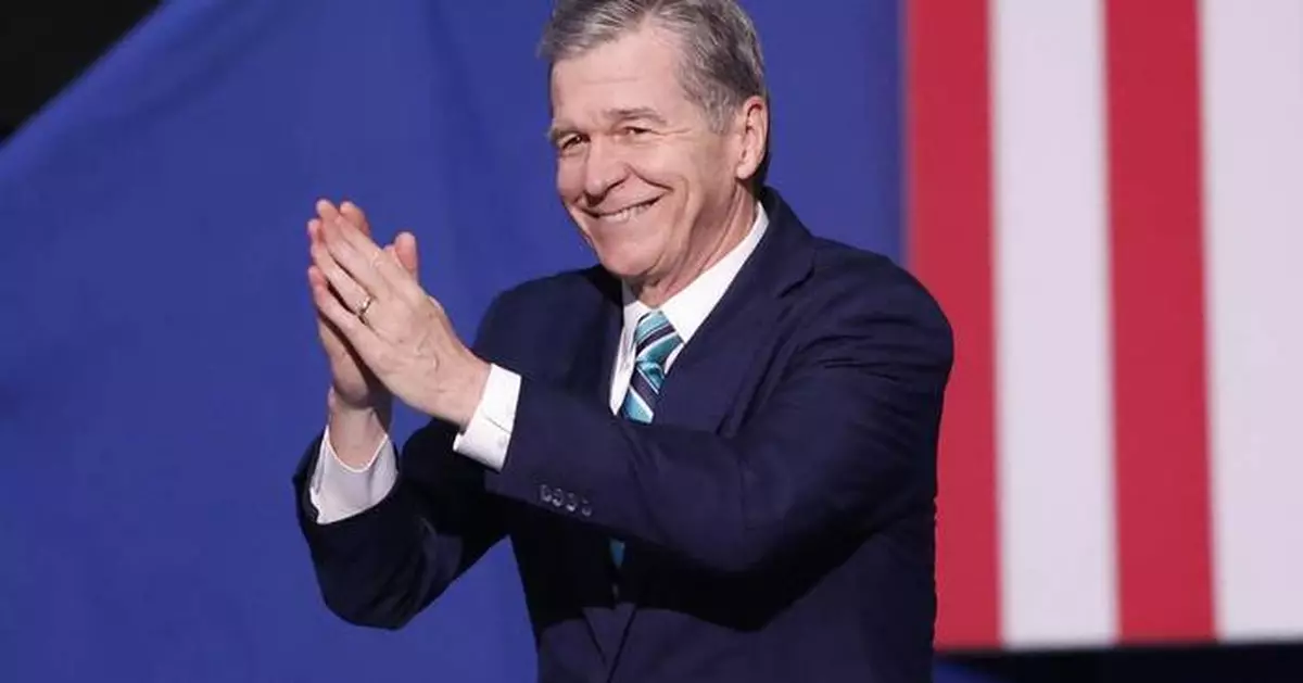 After fighting virus, storms and Republicans, departing North Carolina Gov. Cooper focuses on wins