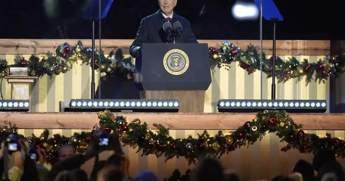 Biden at tree lighting says his holiday wish is for US to continue to seek light, liberty and love