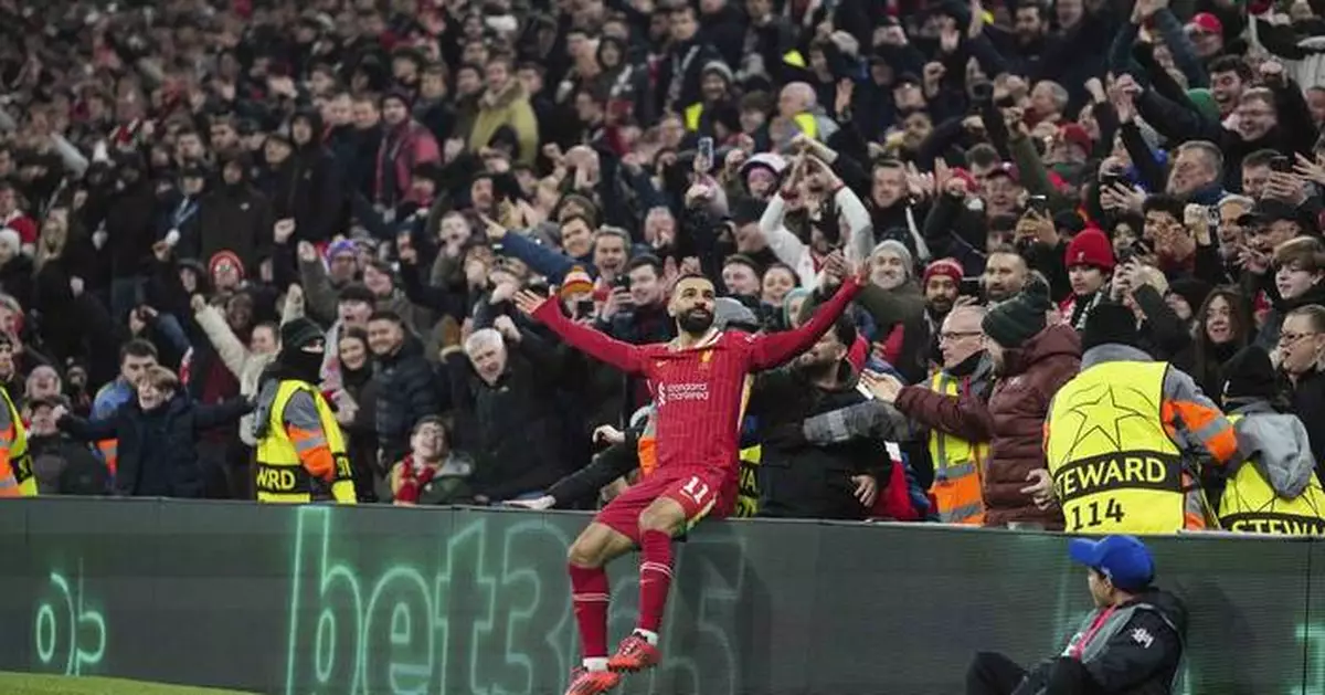 Liverpool beats Lille to reach Champions League round of 16. Barcelona wins 9-goal thriller