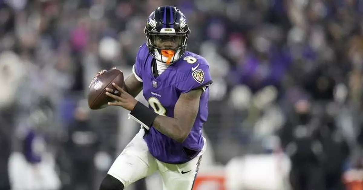 Ravens QB Jackson, the first member of the 4,000-900 club, looks toward playoff run