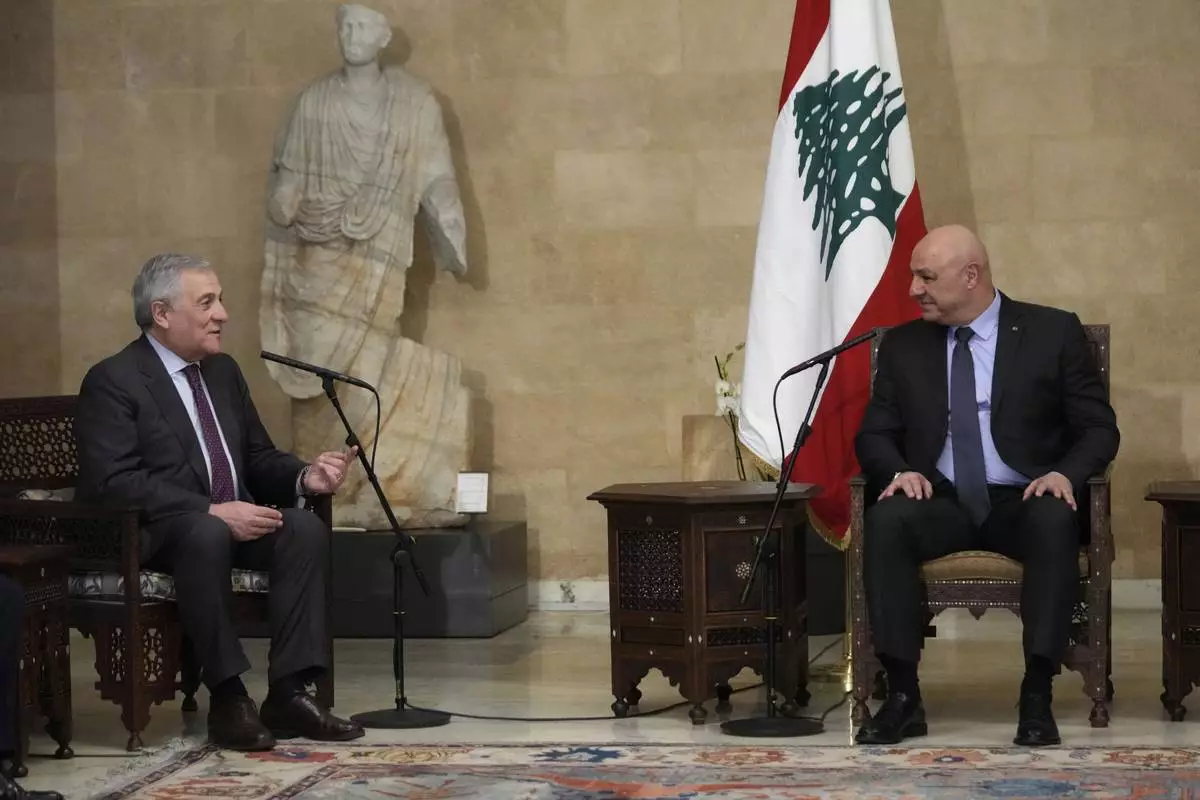 Lebanese President Joseph Aoun, right, meets with Italian Foreign Minister Antonio Tajani at the presidential palace in Baabda, east of Beirut, Lebanon, Friday, Jan. 10, 2025. (AP Photo/Hussein Malla)