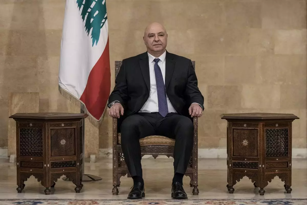 Newly-elected Lebanese President Joseph Aoun, sits at the presidential palace in Baabda, east of Beirut, Lebanon, Thursday, Jan. 9, 2025. (AP Photo/Bilal Hussein)