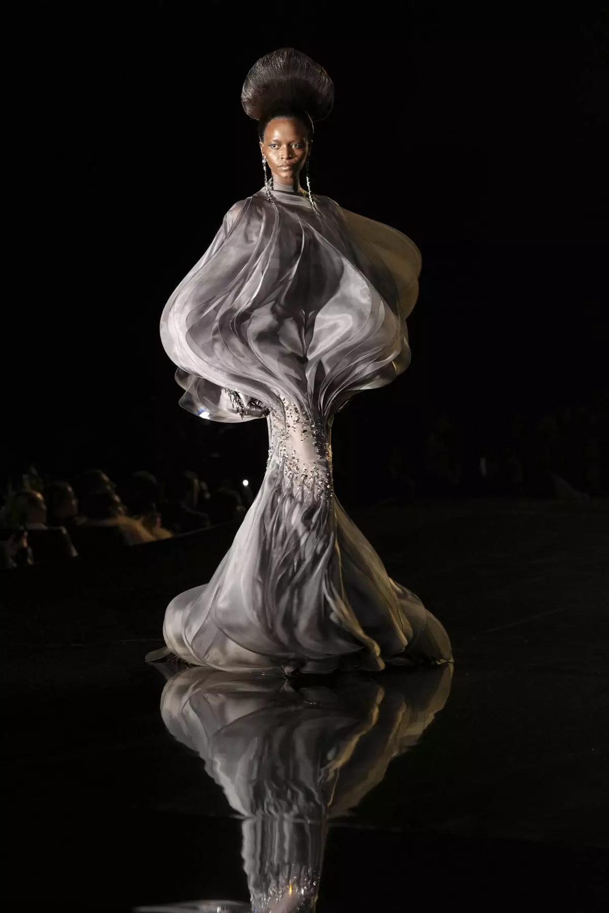 A model wears a creation as part of Stephane Rolland Haute Couture Spring Summer 2025 collection presented in Paris, Tuesday, Jan. 28, 2025. (AP Photo/Thibault Camus)