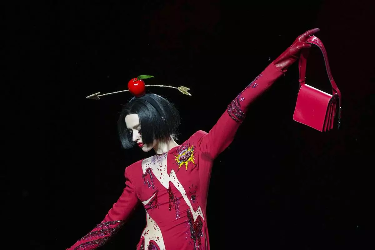 A model wears a creation as part of the Julien Fournie Haute Couture Spring Summer 2025 collection, that was presented in Paris, Tuesday, Jan. 28, 2025. (AP Photo/Lewis Joly).