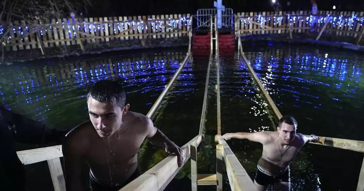 Warm weather threatens Epiphany ice water plunges for Russia's Orthodox Christians