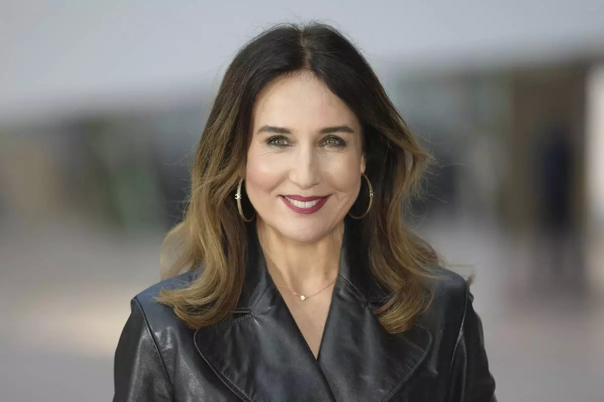 Elsa Zylberstein arrives at the Chanel Haute Couture Spring Summer 2025 collection, to be presented in Paris, Tuesday, Jan. 28, 2025. (AP Photo/Thibault Camus)