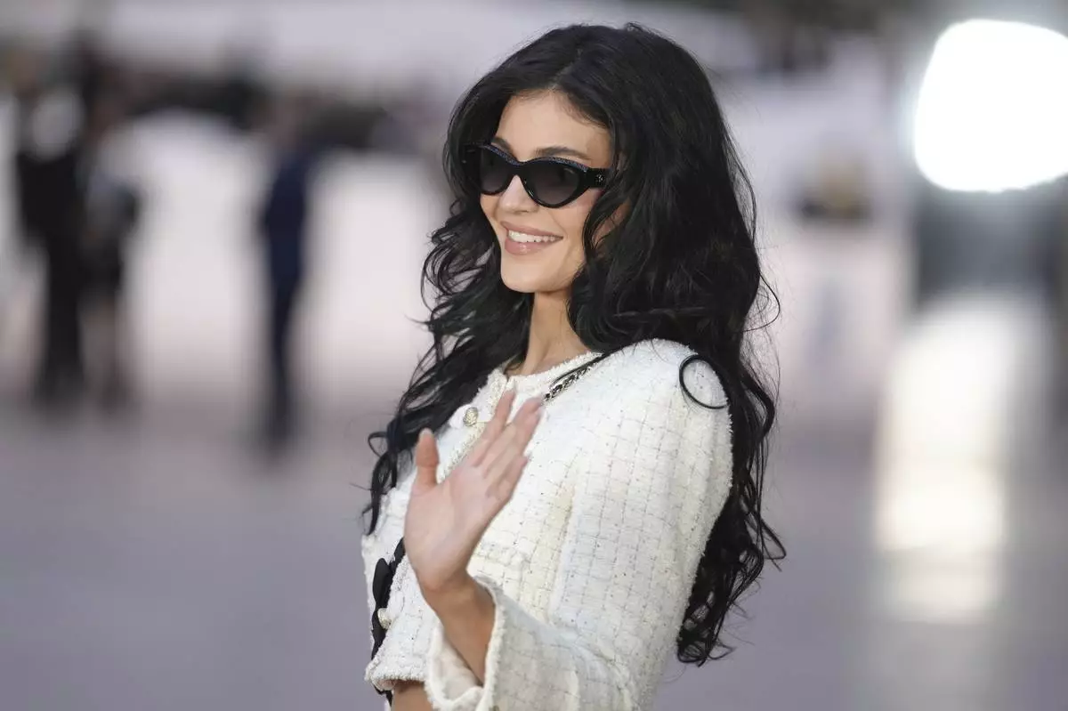 Kylie Jenner arrives at the Chanel Haute Couture Spring Summer 2025 collection, to be presented in Paris, Tuesday, Jan. 28, 2025. (AP Photo/Thibault Camus)