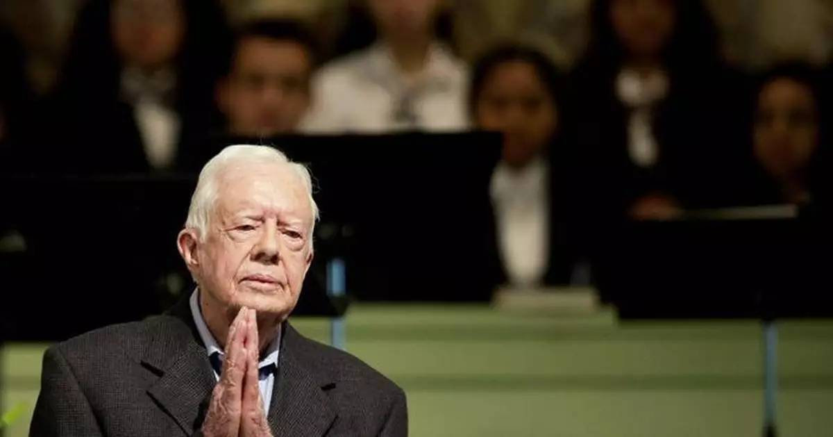 Jimmy Carter's funeral begins by tracing 100 years from rural Georgia to the world stage