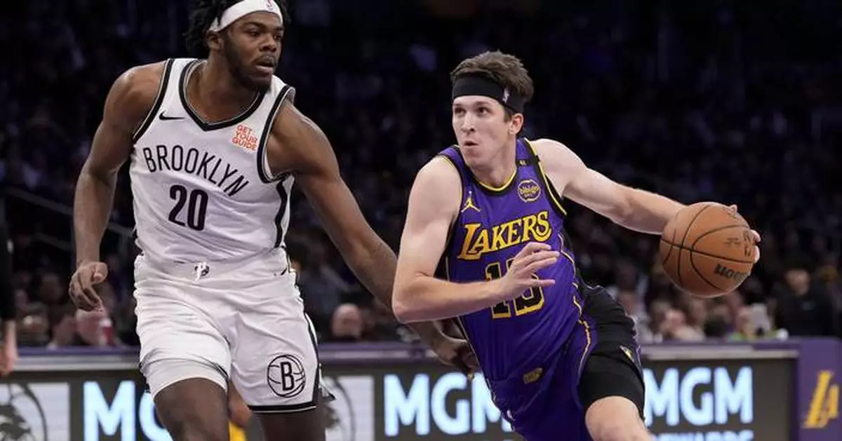 Austin Reaves scores a career-high 38 points as Lakers hold on for 102-101 victory over Nets