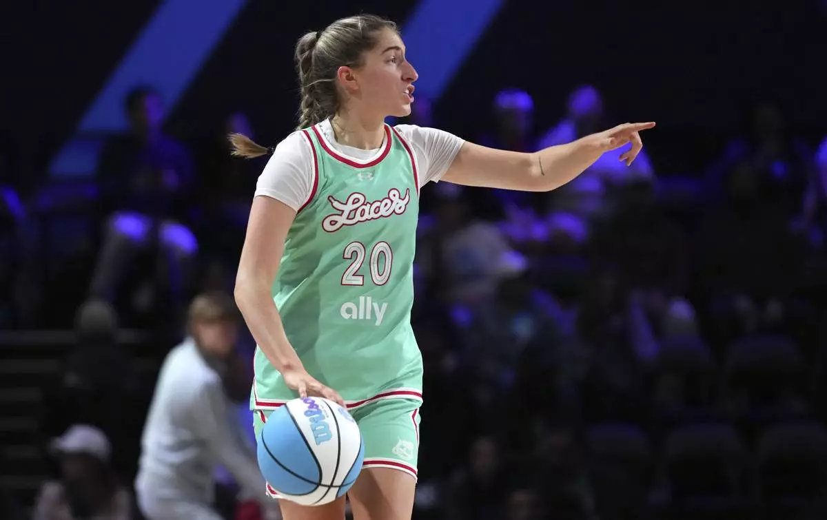Laces guard Kate Martin dribbles during the first half of an Unrivaled 3-on-3 basketball game against Vinyl, Friday, Jan. 24, 2025, in Medley, Fla. (AP Photo/Lynne Sladky)