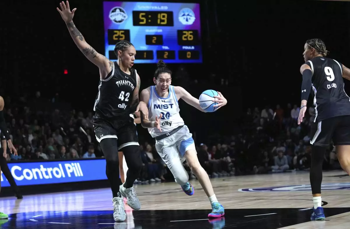 Phantom center Brittney Griner (42) defends against Mist forward Breanna Stewart (30) during the first half of an Unrivaled 3-on-3 basketball game Friday, Jan. 24, 2025, in Medley, Fla. (AP Photo/Lynne Sladky)