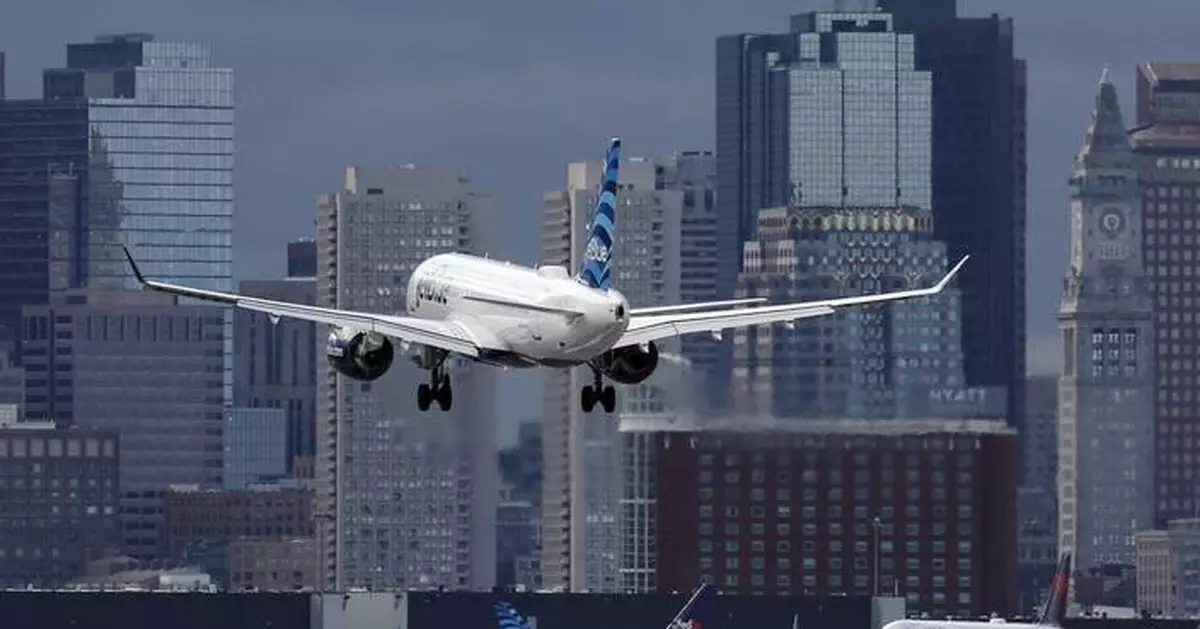 JetBlue passenger suddenly opens exit door as flight is taxiing for takeoff at Boston airport