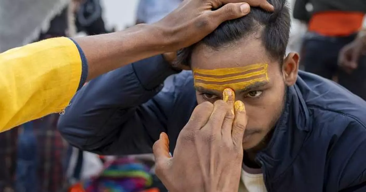 Sacred strokes of color on foreheads are a major display of Hinduism at India’s Maha Kumbh festival