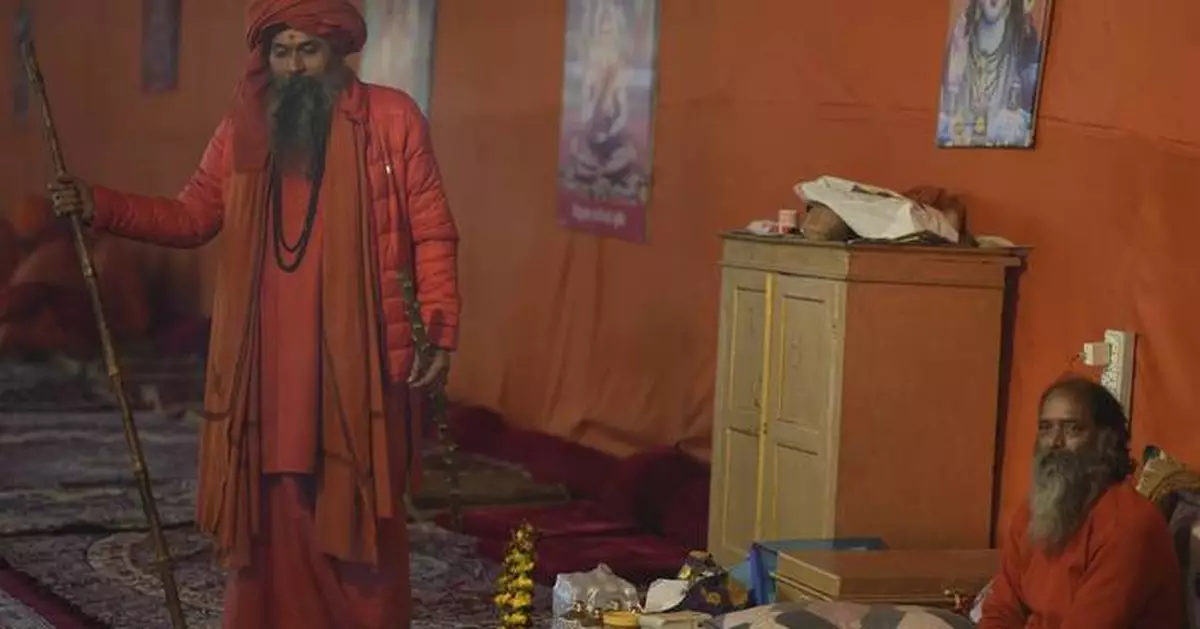 Millions of pilgrims and naked, ash-smeared ascetics take holy dips in India's mega Hindu festival