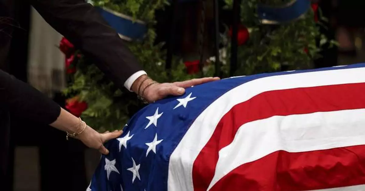 Admirers of Jimmy Carter travel to view his casket lying in state at Capitol