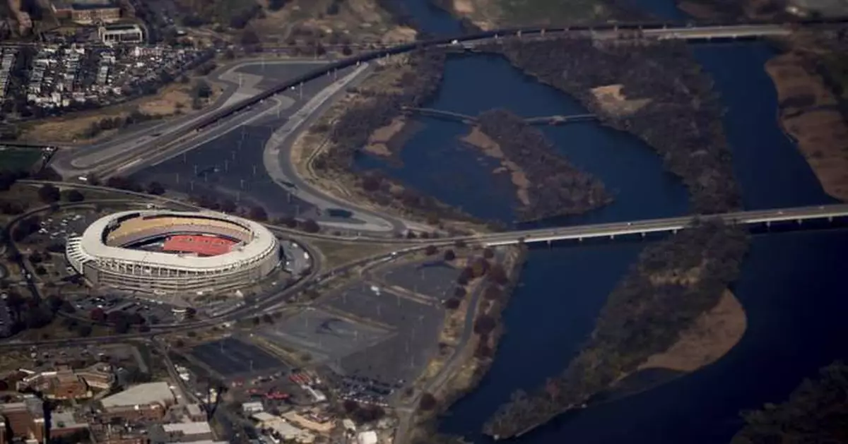 Biden signs RFK Stadium land bill into law, a step toward potential Commanders stadium in Washington