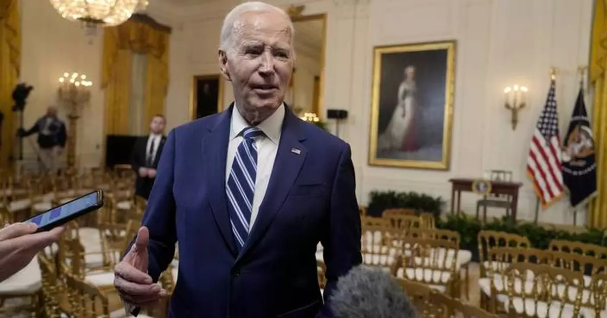 Biden tells New Orleans mourners they are not alone as he honors victims of attack