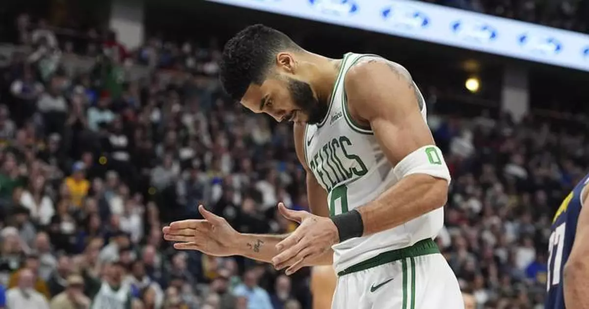 Jayson Tatum scores 29, Porzingis adds 25 as Celtics hold off depleted Nuggets 118-106