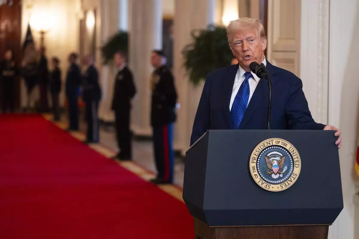 President Donald Trump speaks before signing the Laken Riley Act in the East Room of the White House, Wednesday, Jan. 29, 2025, in Washington. (AP Photo/Evan Vucci)