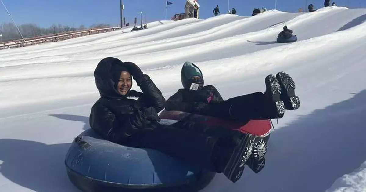 Scarves over headscarves, Muslim women’s outdoors group tackles snow tubing in Minnesota