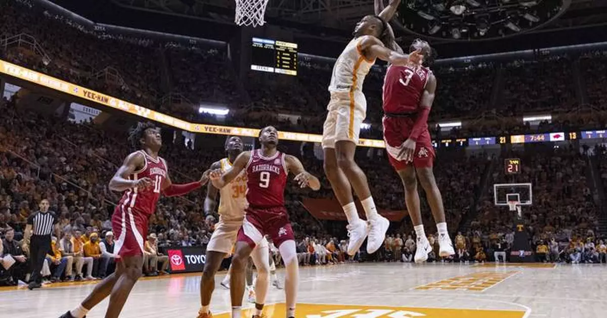 No. 1 Tennessee beats No. 23 Arkansas 76-52 to match best start in program history