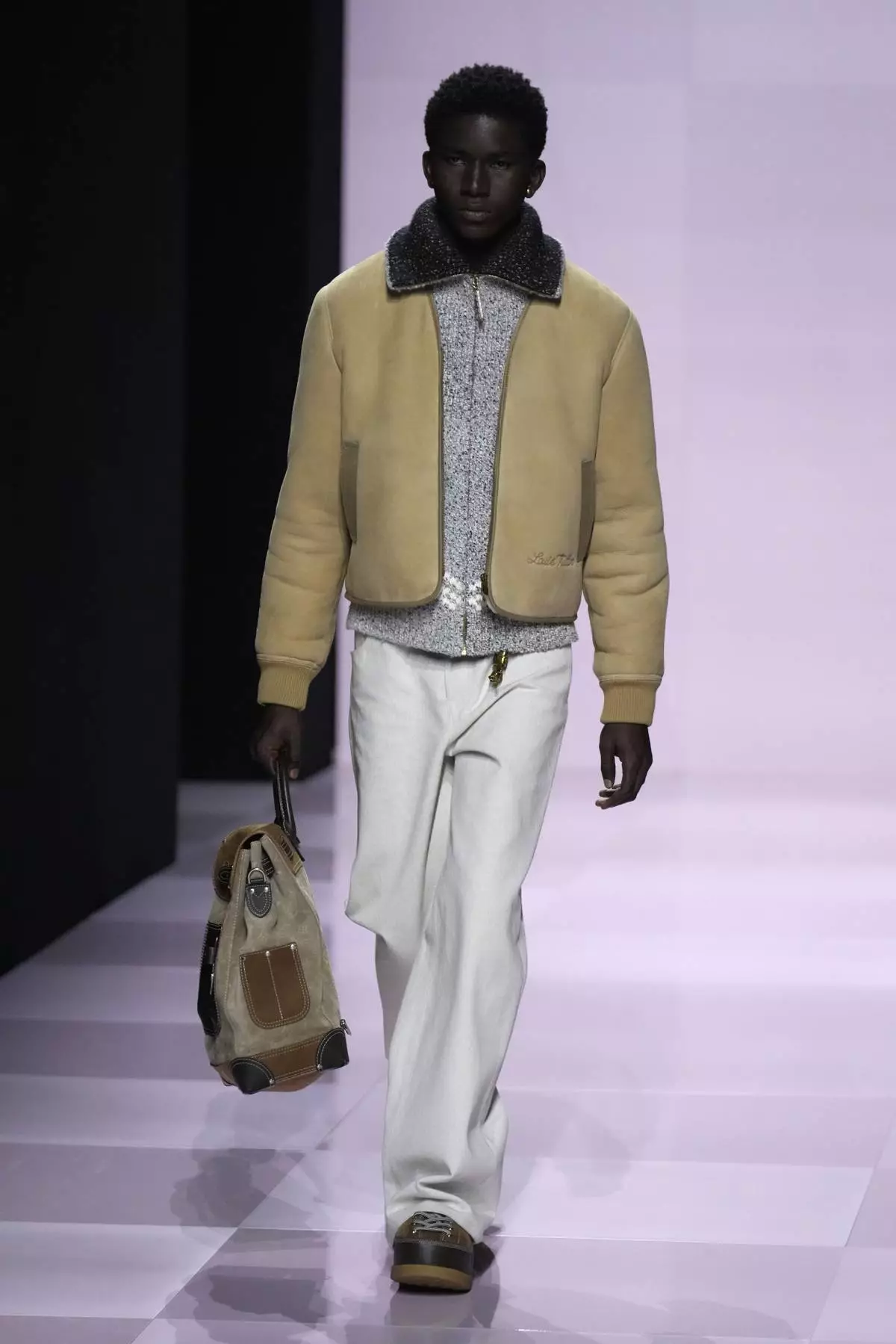 A model wears a creation as part of the men's Louis Vuitton Fall-Winter 2025-2026 collection, that was presented in Paris, Tuesday, Jan. 21, 2025. (AP Photo/Michel Euler)