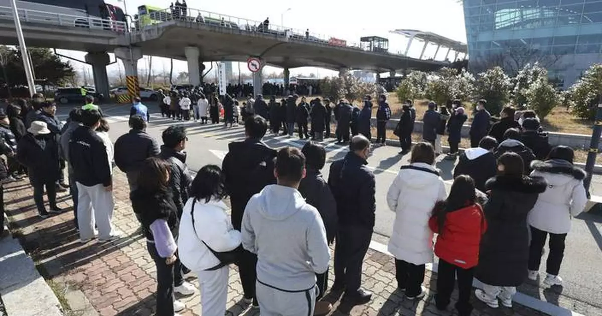 South Korea air crash investigators extract black box data as grieving families mourn the victims